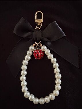 Pearl Beaded Keychain Zipper Pull with Red Ladybug Charm And Black Bow
